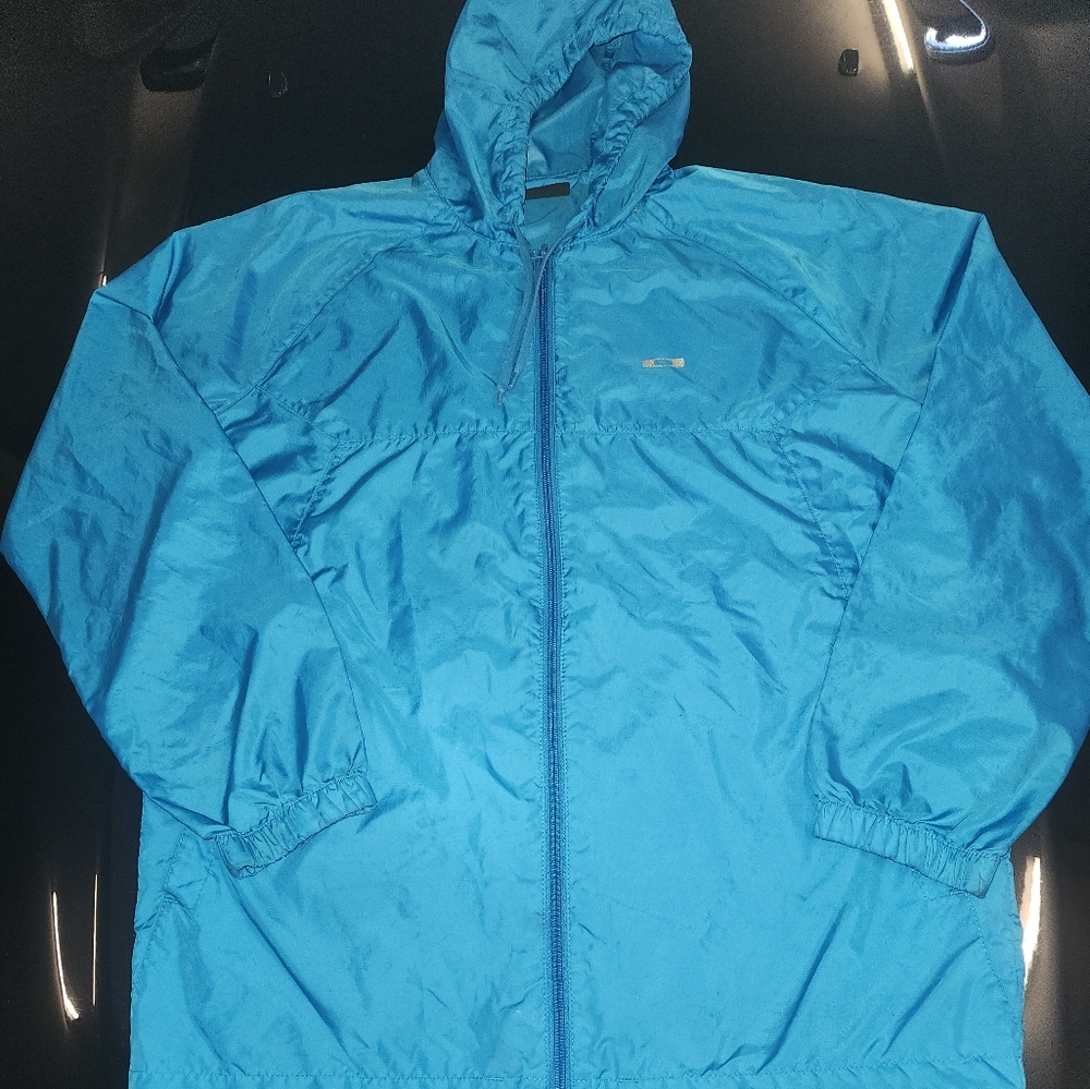 Oakley hooded packable men's windbreaker size medium color periwinkle